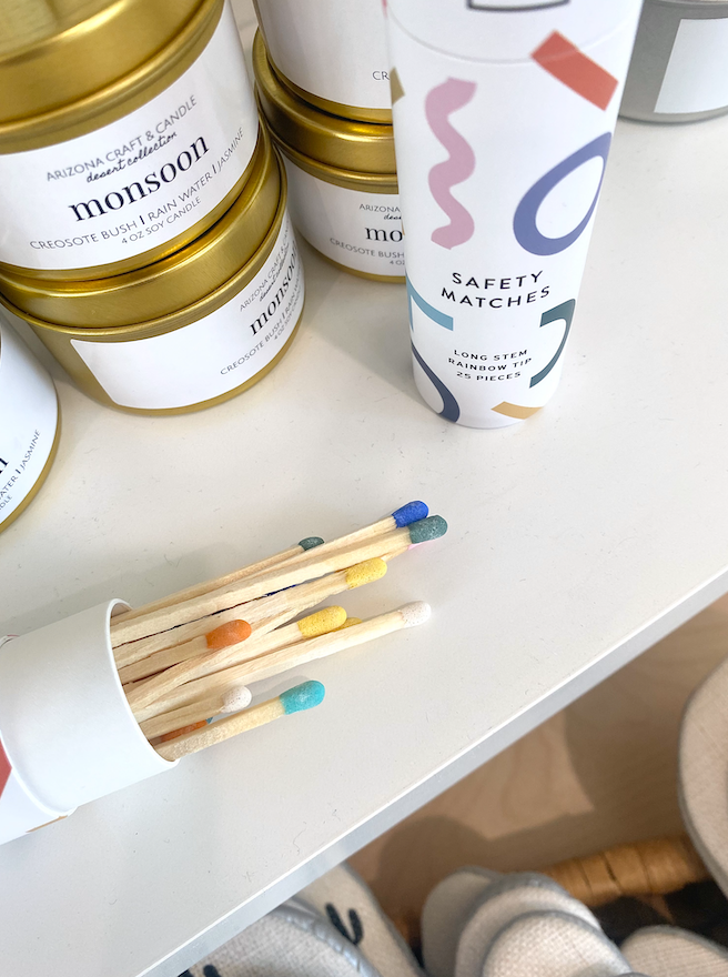 Brightly tipped matches spilling out of jar on a shelf