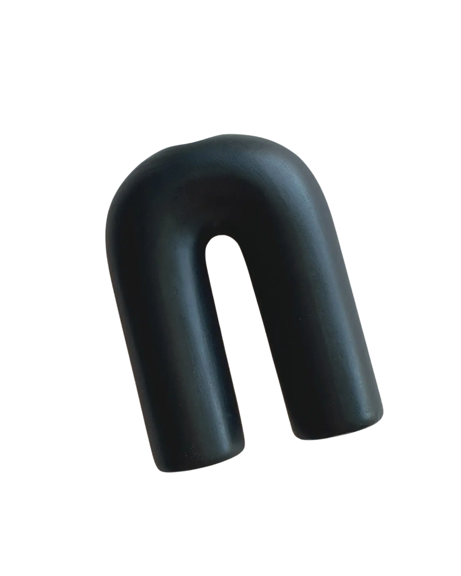 Black candle holder in an arch shape