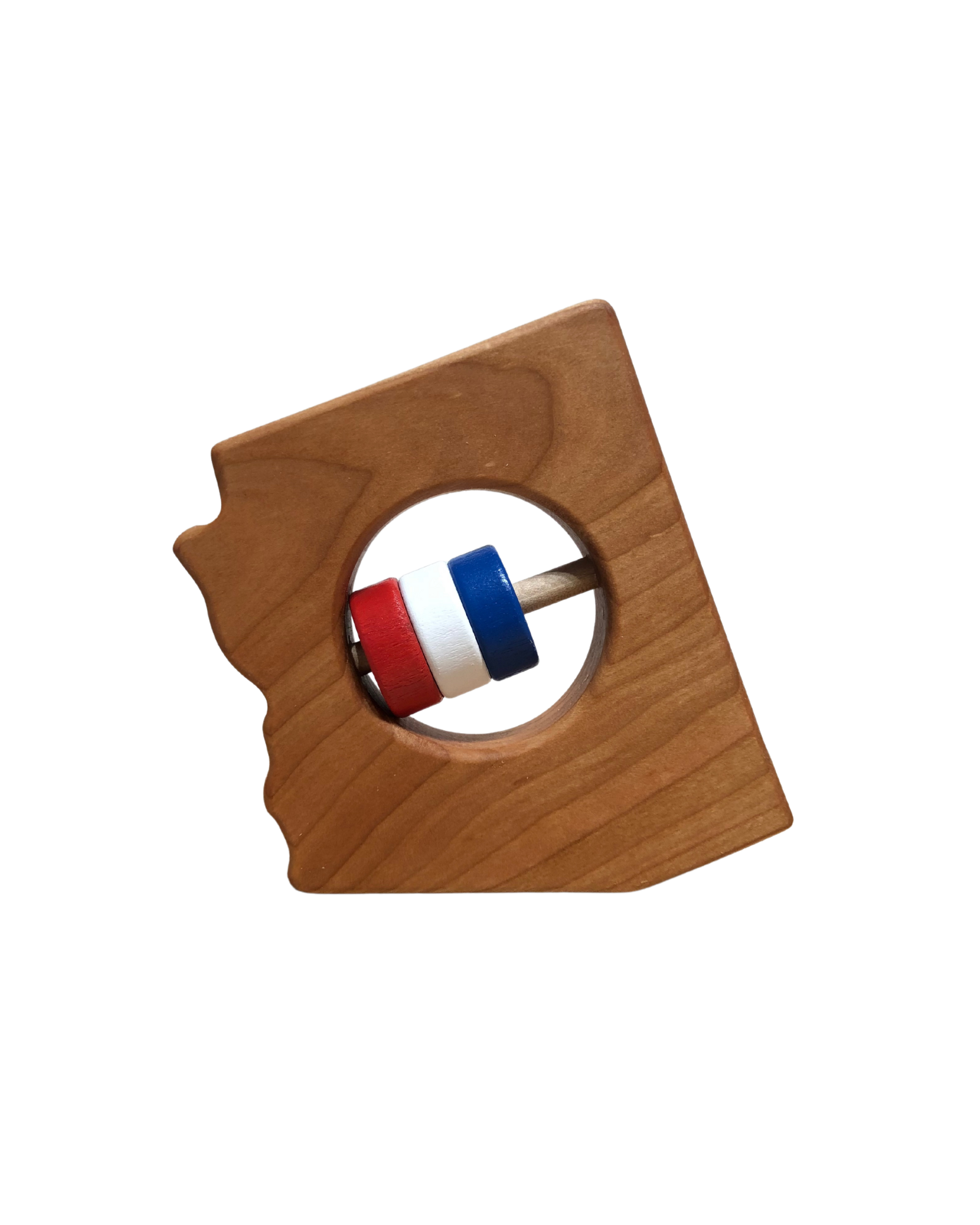 Light wood rattle in the shape of arizona with a cutout in the center and a dowel with red, white, and blue wooden beads