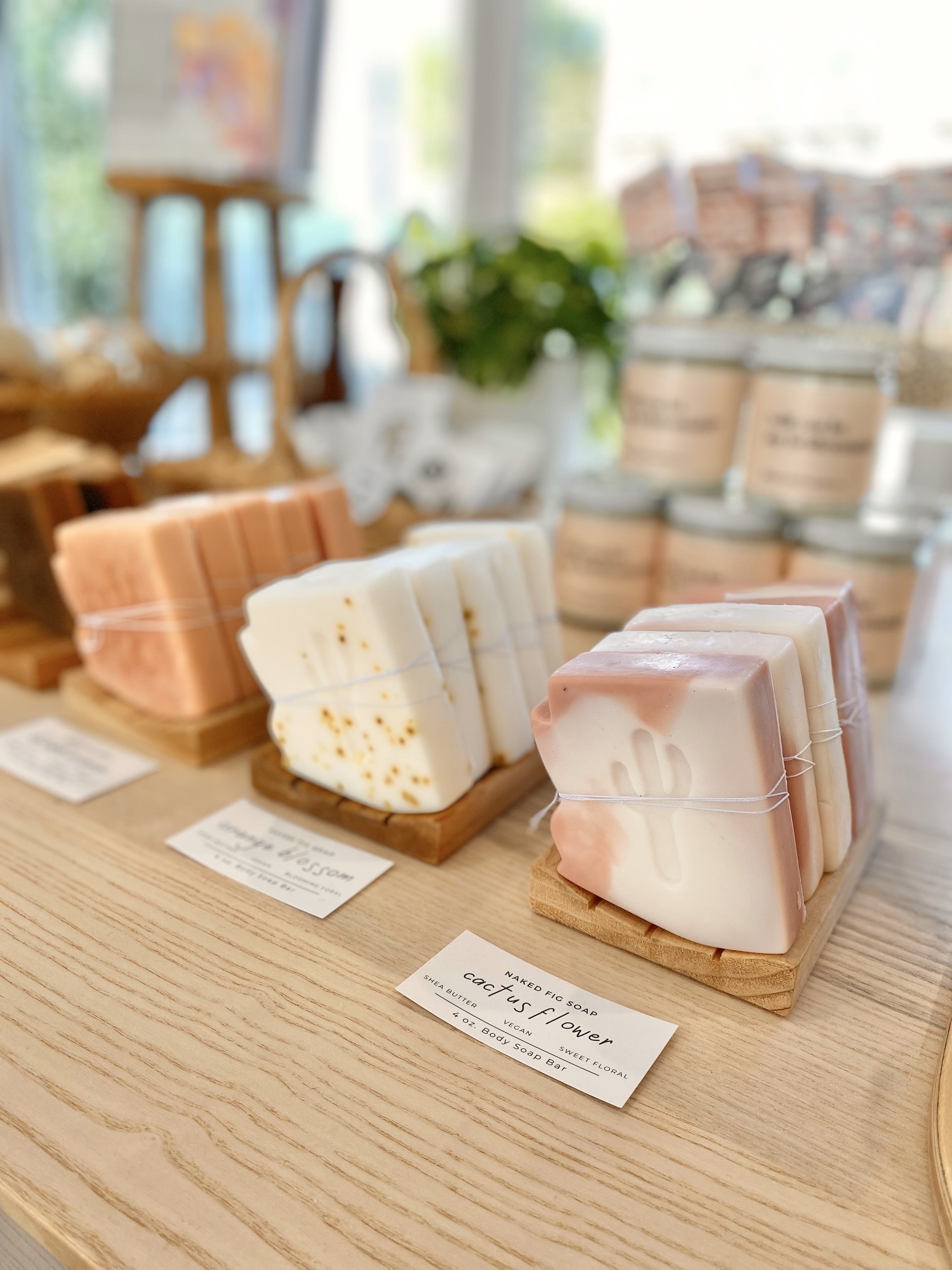 Trio of soaps sitting on a shop counter