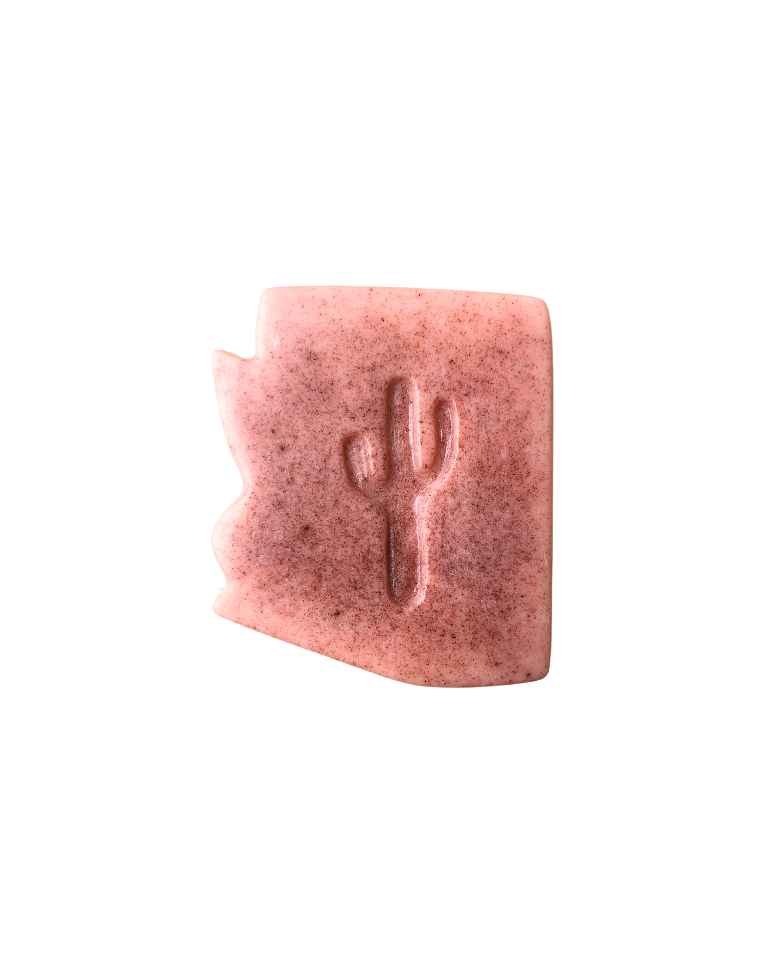 Pink arizona shaped soap with red specks and a sagauro shape in the middle of the bar