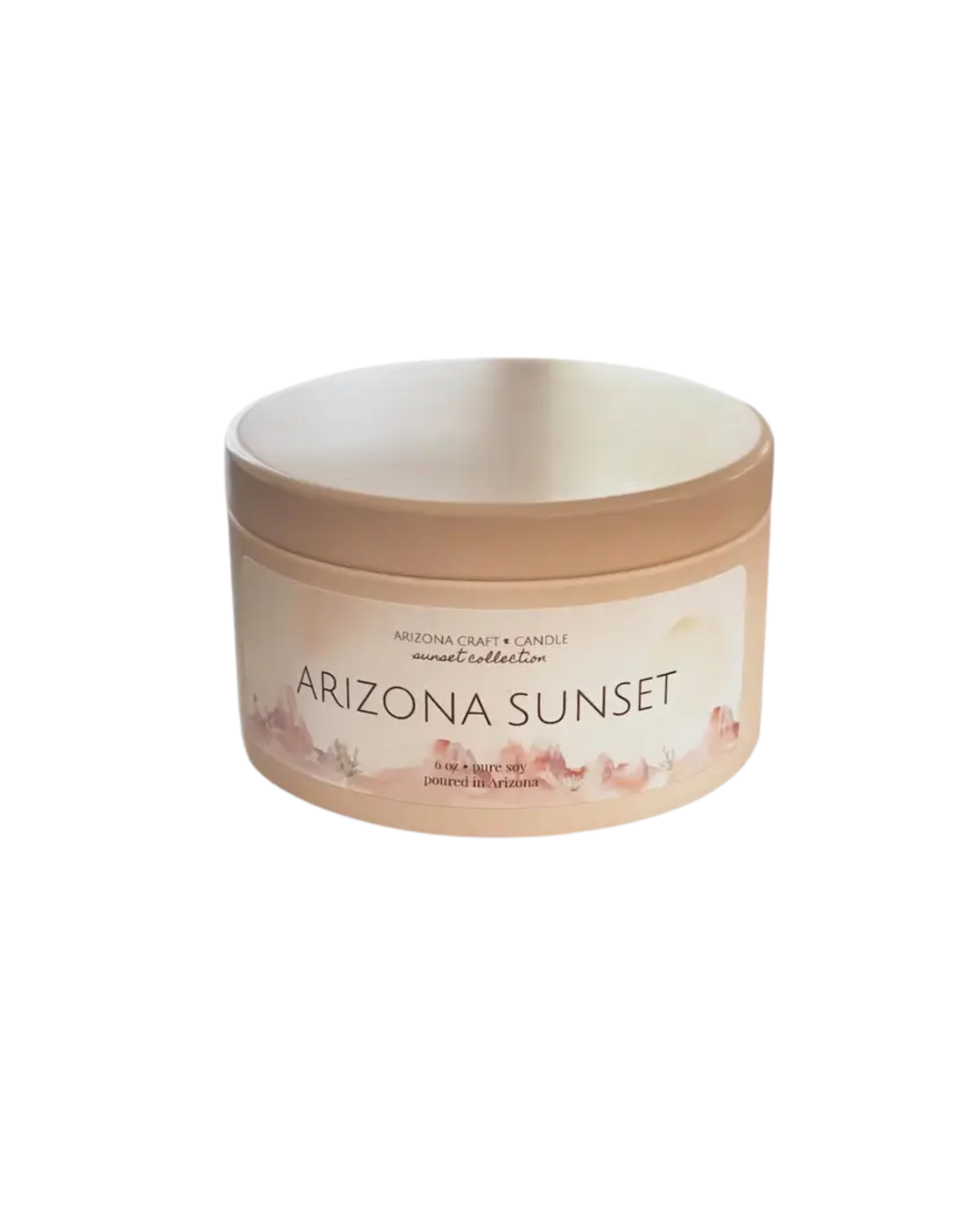 Peach colored candle tin with a label featuring a desert landscape and the words "arizona sunset" 