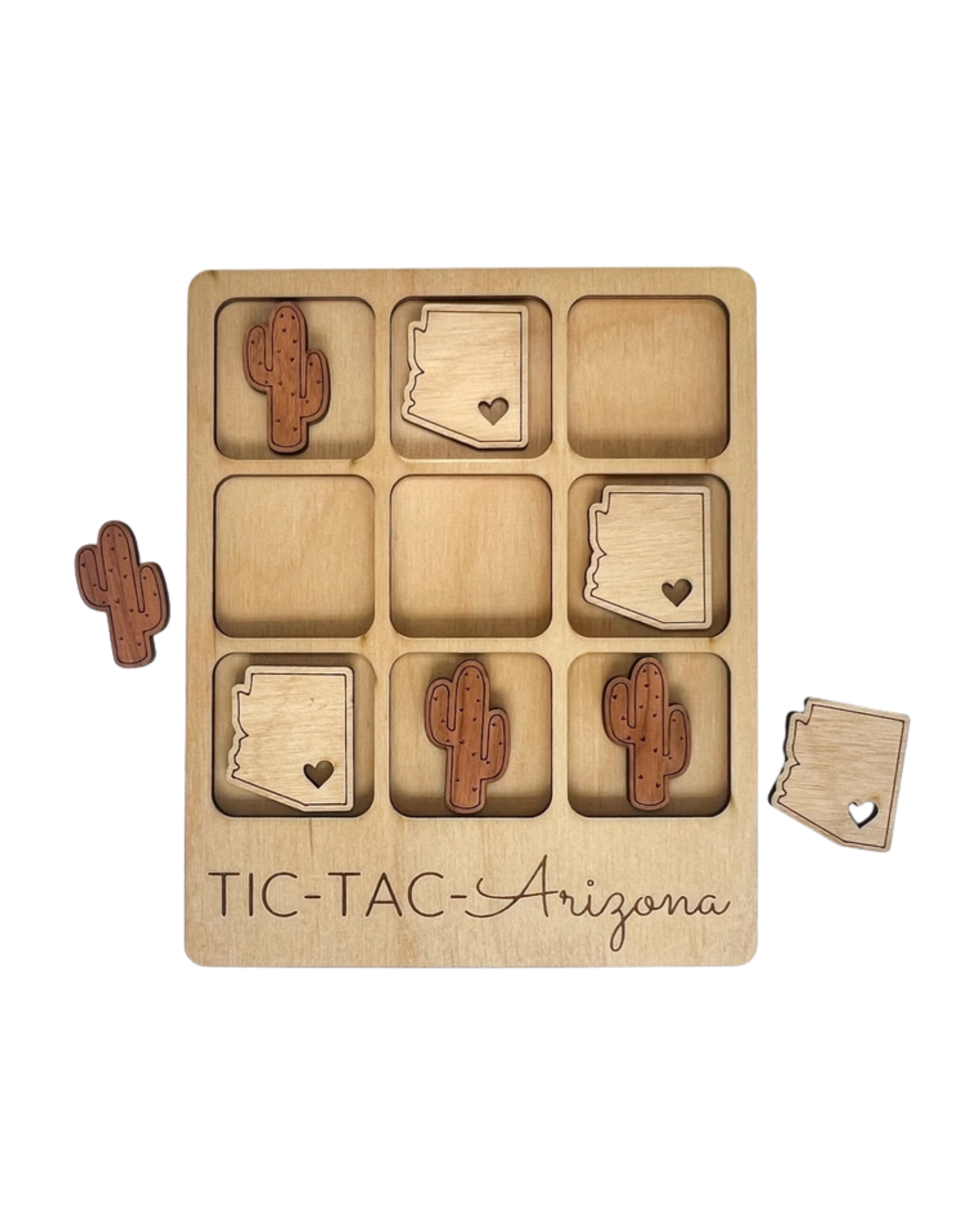 Light wood tic-tac-toe board with saguaro cacti and arizona state cutouts for pieces