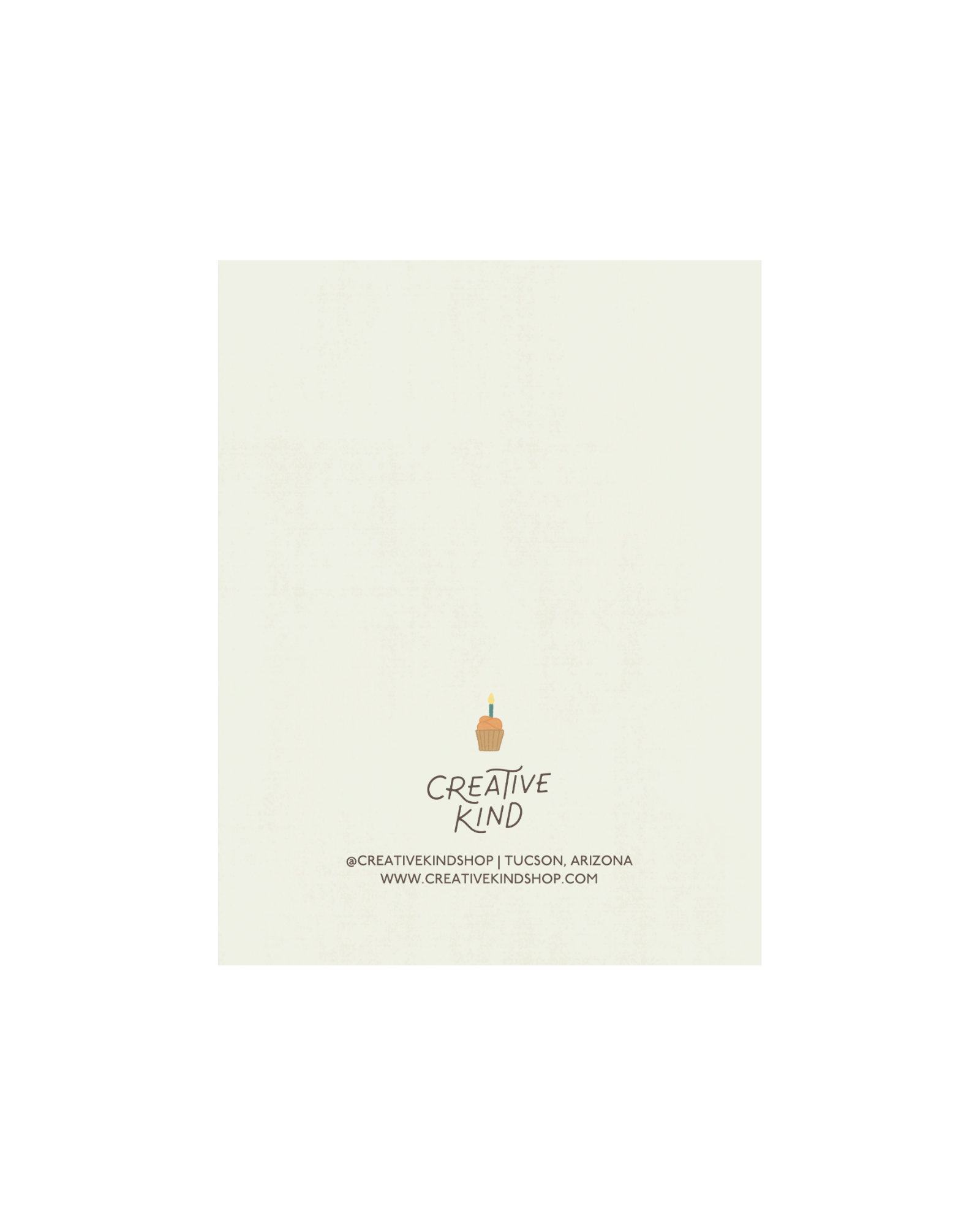 Back of greeting card, birthday cupcake with candle centered above creative kind logo