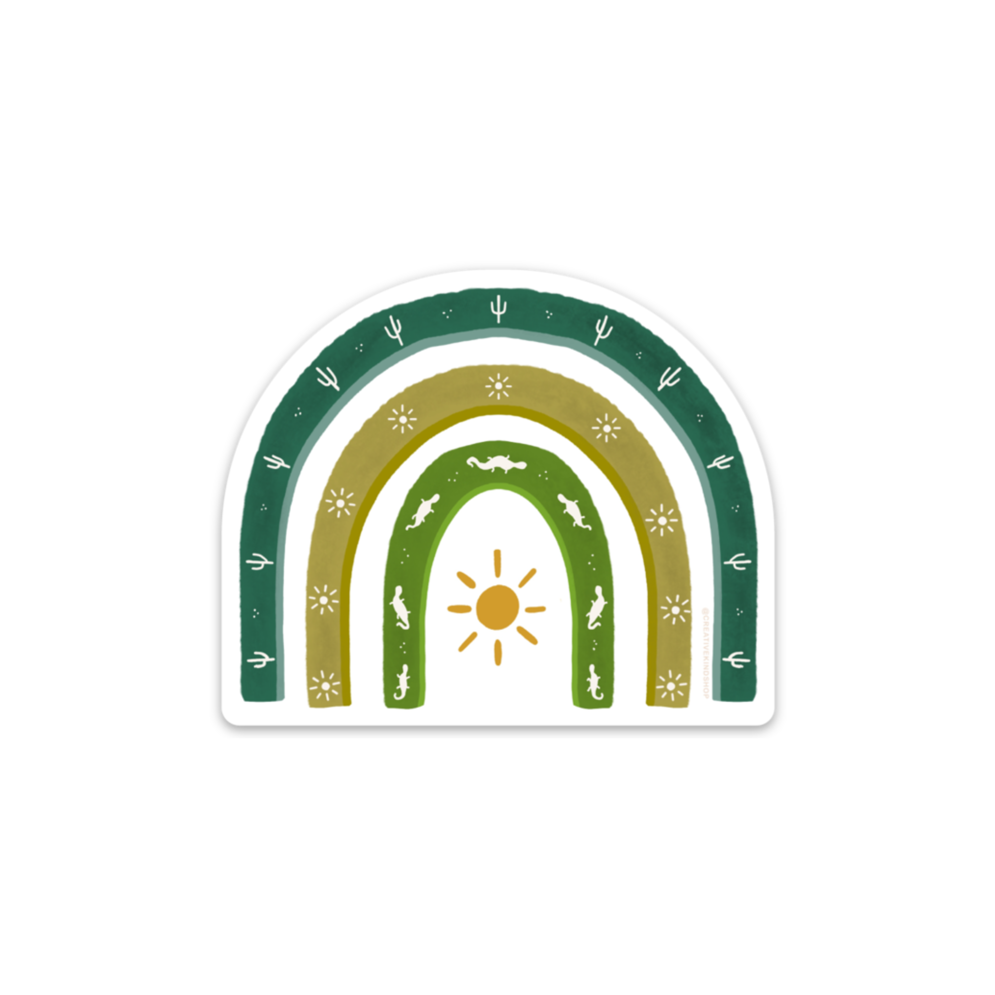 Die cut sticker of a rainbow in various shades of green with saguaros, suns, and lizards in the arches
