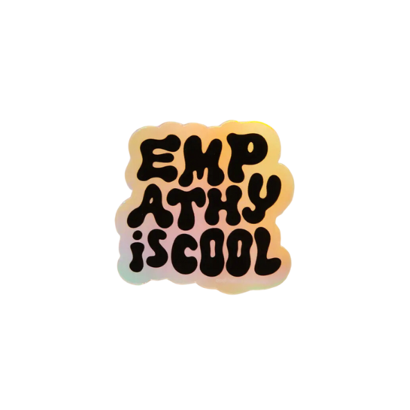 Die cut sticker with holographic background and black text reading Empathy is Cool