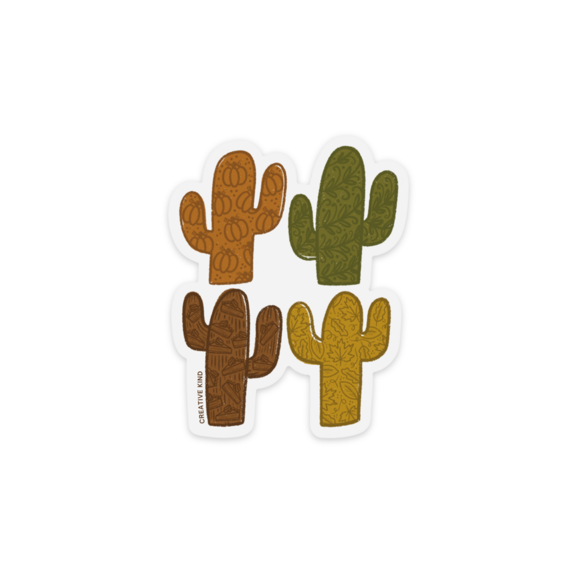 Clear vinyl sticker of four saguaro cactus in orange, green, brown, and yellow with fall sketches on the cacti